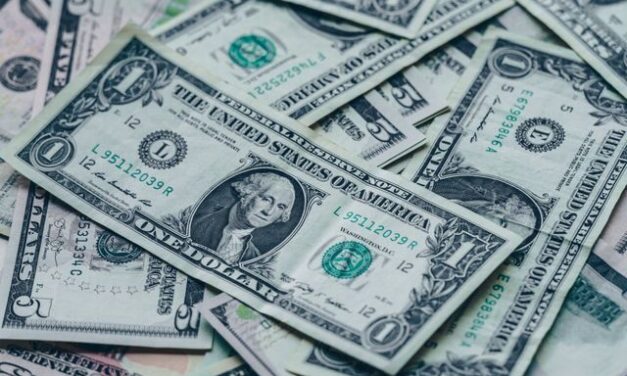 Dollar sinks, euro soars as traders bet the Fed is done hiking