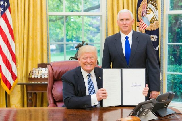 Trump Rejects New AI Guardrails as Amodei Calls for Slower Development